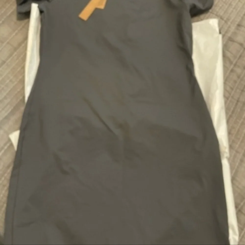 Skims recycled swim dress.